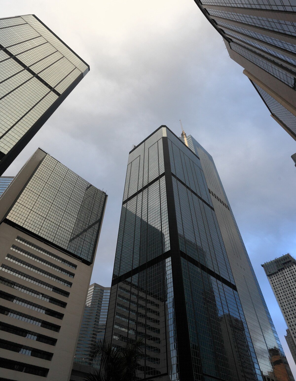 Upward architectural view of modern commercial towers